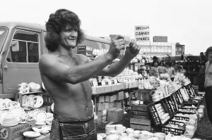 Bare chested Alan Dobbs who runs a pottery stall in London' Bare chested Alan Dobbs who runs a pottery stall in London'