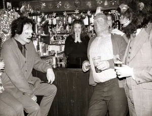 A barmaid is faced with a man dressed as Frankensteins Monster A barmaid is faced with a man dressed as Frankensteins Monster