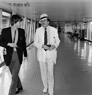 Barry Humphries leaving Heathrow Airport for New York. 10th August 1983 Barry Humphries leaving Heathrow Airport for New York. 10th August 1983