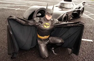 Batman car July 1998 Batman kneeling in front of car Batman car July 1998 Batman kneeling in front of car