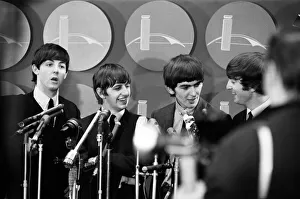The Beatles answer questions for newsmen and journalists in New York after their arrival The Beatles answer questions for newsmen and journalists in New York after their arrival