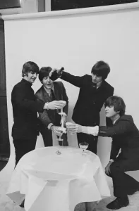 Beatles celebrating chart success. January 1965 Beatles celebrating chart success. January 1965