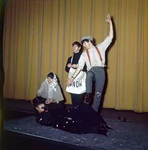 The Beatles in costume seen here rehearsing on stage for their Christmas Show at The Beatles in costume seen here rehearsing on stage for their Christmas Show at