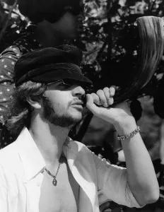Beatles drummer Ringo Starr blowing a horn while on holiday in Tobago, January 1966 Beatles drummer Ringo Starr blowing a horn while on holiday in Tobago, January 1966