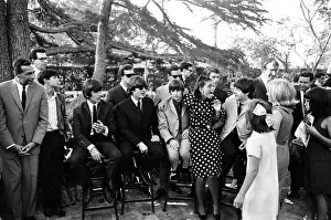 The Beatles at a Hollywood garden party on their American Tour The Beatles at a Hollywood garden party on their American Tour