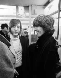 Beatles John Lennon and George Harrison at Heathrow Airport before departing to India Beatles John Lennon and George Harrison at Heathrow Airport before departing to India