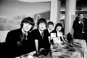 The Beatles pose with their MBEs at a press conference held at the Saville Theatre The Beatles pose with their MBEs at a press conference held at the Saville Theatre