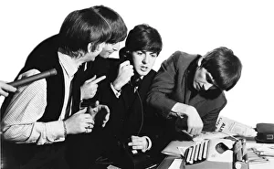The Beatles prepare for a New York press conference during the tour of the USA The Beatles prepare for a New York press conference during the tour of the USA