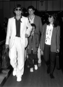 Former Beatles singer and guitarist George Harrison and family with a child of a friend Former Beatles singer and guitarist George Harrison and family with a child of a friend