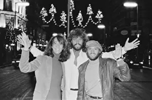 Images Dated 22nd November 1981: The Bee Gees check out the christmas lights in Regent Street London 22nd November 1981