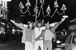 Images Dated 22nd November 1981: The Bee Gees check out the christmas lights in Regent Street London 22nd November 1981