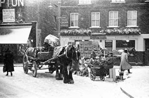 Beer delivery in the snow to The Old Crown public house in Union Street in Kingston Upon Beer delivery in the snow to The Old Crown public house in Union Street in Kingston Upon
