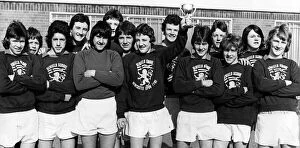 Images Dated 11th March 1977: Benfield School skipper Steve Bruce holds up the Evening Chronicle Cup after his side had