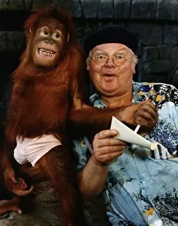 Images Dated 21st March 1991: Benny Hill Actor Comedian With An Orang-U-Tan