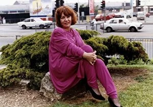 Images Dated 26th April 1991: Beverley Phillips actress sitting on rock A©Mirrorpix