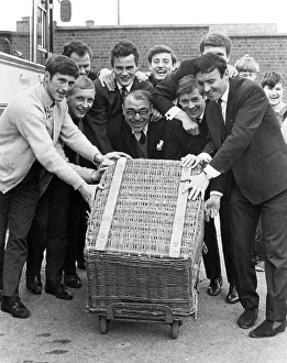Birmingham City club coach driver Mr Dennis Peters is helped by players to load Birmingham City club coach driver Mr Dennis Peters is helped by players to load