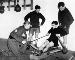 Birmingham City footballer Eddie Brown takes the strain on the rowing machine watched by Birmingham City footballer Eddie Brown takes the strain on the rowing machine watched by