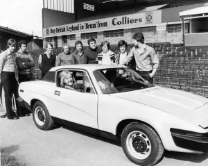 Birmingham City footballers looking at the new TR7 Sports car that one of them could win Birmingham City footballers looking at the new TR7 Sports car that one of them could win