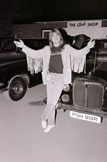 Black Sabbath singer Ozzy Osbourne poses next to a car after performing in concert August Black Sabbath singer Ozzy Osbourne poses next to a car after performing in concert August