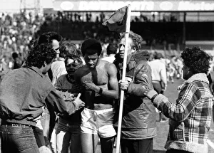 Blues fans mob the shirtless Howard Gayle after the news of relegation Blues fans mob the shirtless Howard Gayle after the news of relegation