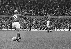Bobby Charlton, in the number 9 shirt for Manchester United, at Old Trafford Bobby Charlton, in the number 9 shirt for Manchester United, at Old Trafford