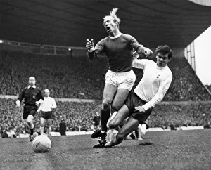Bobby Charlton is tacked by Cyril Knowles during the Manchester United verses Tottenham Bobby Charlton is tacked by Cyril Knowles during the Manchester United verses Tottenham