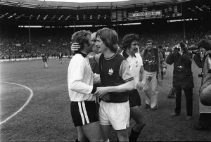 Bobby Moore is congratulated by Kevin Locke at Wembley after the 1975 FA Cup Final Bobby Moore is congratulated by Kevin Locke at Wembley after the 1975 FA Cup Final