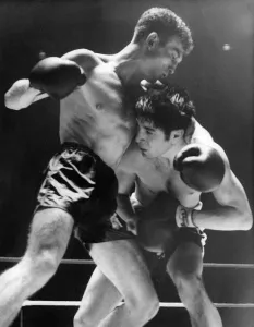 Bobby Ros and Willie Toweel in action during their Lightweight match at King' Bobby Ros and Willie Toweel in action during their Lightweight match at King'