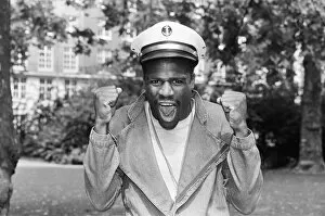 Images Dated 28th August 1986: Boxer Errol Christie wearing a sailors hat. 28th August 1986