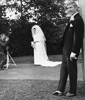 Boxer Ken Buchanan poses for the press during his wedding whilst his wife Carol poses for Boxer Ken Buchanan poses for the press during his wedding whilst his wife Carol poses for