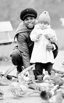 Boxer Kirkland Laing seen here with his child. 2nd December 1987 Boxer Kirkland Laing seen here with his child. 2nd December 1987