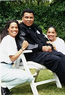 Boxer Muhammad Ali (Cassius Clay) with daughters. August 1992 Boxer Muhammad Ali (Cassius Clay) with daughters. August 1992