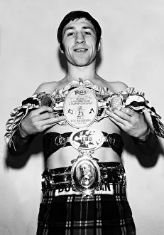 Boxing Ken Buchanan holding up the World Lightweight Championship belt Boxing Ken Buchanan holding up the World Lightweight Championship belt