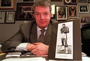 Boxing Promoter Tommy Gilmour December 1999 with a signed print of Mohammed Ali Boxing Promoter Tommy Gilmour December 1999 with a signed print of Mohammed Ali