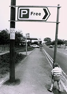 A boy urinating on a free parking sign - Pee for free! Humour A boy urinating on a free parking sign - Pee for free! Humour