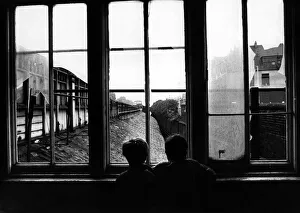 Two boys are watching out for trains at the derelict Heaton Railway Station on 4th Two boys are watching out for trains at the derelict Heaton Railway Station on 4th