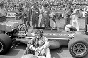 Brands Hatch. Jackie Stewart sitting beside his car before race. July 1970 70-6868-001 Brands Hatch. Jackie Stewart sitting beside his car before race. July 1970 70-6868-001