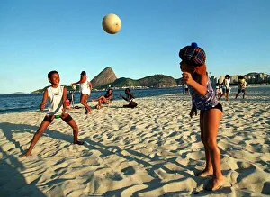 Brazil World Cup feature May 1998 Rio De Janeiro football mad children play on beach with Brazil World Cup feature May 1998 Rio De Janeiro football mad children play on beach with