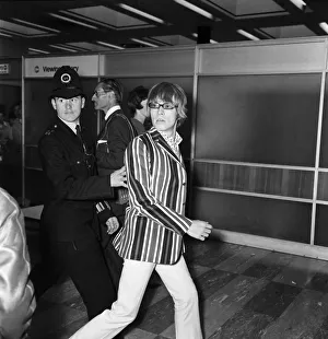 Brian Jones of The Rolling Stones at London Airport on 23 June 1966 en route for America Brian Jones of The Rolling Stones at London Airport on 23 June 1966 en route for America