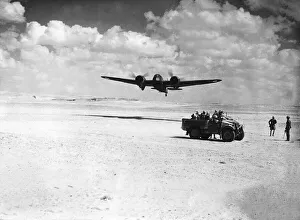 A Bristol Blenheim of the RAF Middle East Command flies over a British long range desert A Bristol Blenheim of the RAF Middle East Command flies over a British long range desert