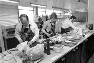 Britain's top man in the kitchen competition. Three chefs preparing their dishes Britain's top man in the kitchen competition. Three chefs preparing their dishes