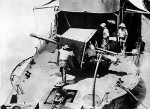 The British gunboat HMS Firefly seen here in action on the Tigris River before being The British gunboat HMS Firefly seen here in action on the Tigris River before being