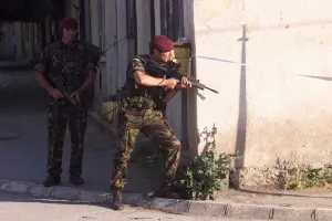 British KFOR paratroopers at the scene where local serb Gunmen in the village of Lipjan British KFOR paratroopers at the scene where local serb Gunmen in the village of Lipjan