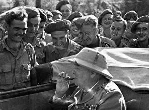 British Prime Minister Winston Churchill lsurrounded by British troops during a vist to British Prime Minister Winston Churchill lsurrounded by British troops during a vist to