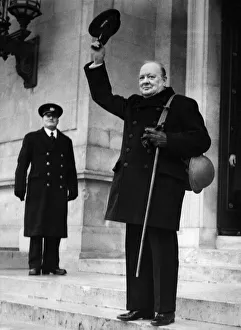 British Prime Minister Winston Churchill carrying his gas mask British Prime Minister Winston Churchill carrying his gas mask