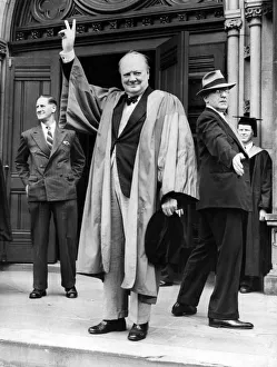 British Prime Minister Winston Churchill gives the famous V Sign in acknowledgement to British Prime Minister Winston Churchill gives the famous V Sign in acknowledgement to