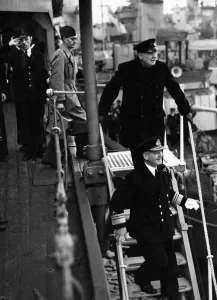 British Prime Minister Winston Churchill leaves a destroyer depot during his visit to British Prime Minister Winston Churchill leaves a destroyer depot during his visit to