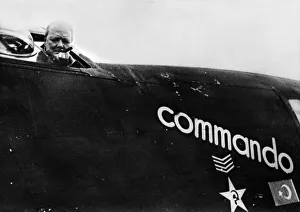 British Prime Minister Winston Churchill looks out from his personal aircraft British Prime Minister Winston Churchill looks out from his personal aircraft