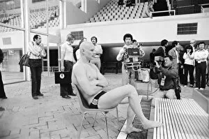 Images Dated 22nd July 1980: British swimmer Duncan Goodhew poses for pictures by the Olympic Swimming Pool in Moscow