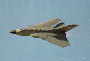 A British Tornado GR1 fighter flies at speed with wings swept back at the Farnborough Air A British Tornado GR1 fighter flies at speed with wings swept back at the Farnborough Air